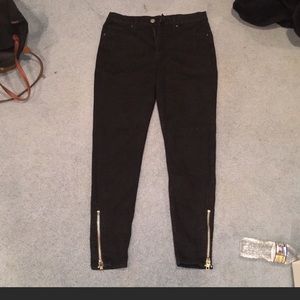 Black BDG jeans with a zipper ankle